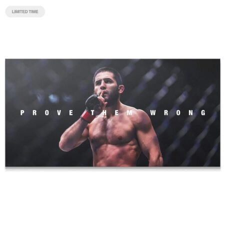 Close-up of Islam Makhachev making the shush gesture with the 'Prove Them Wrong' text overlay on the artwork.