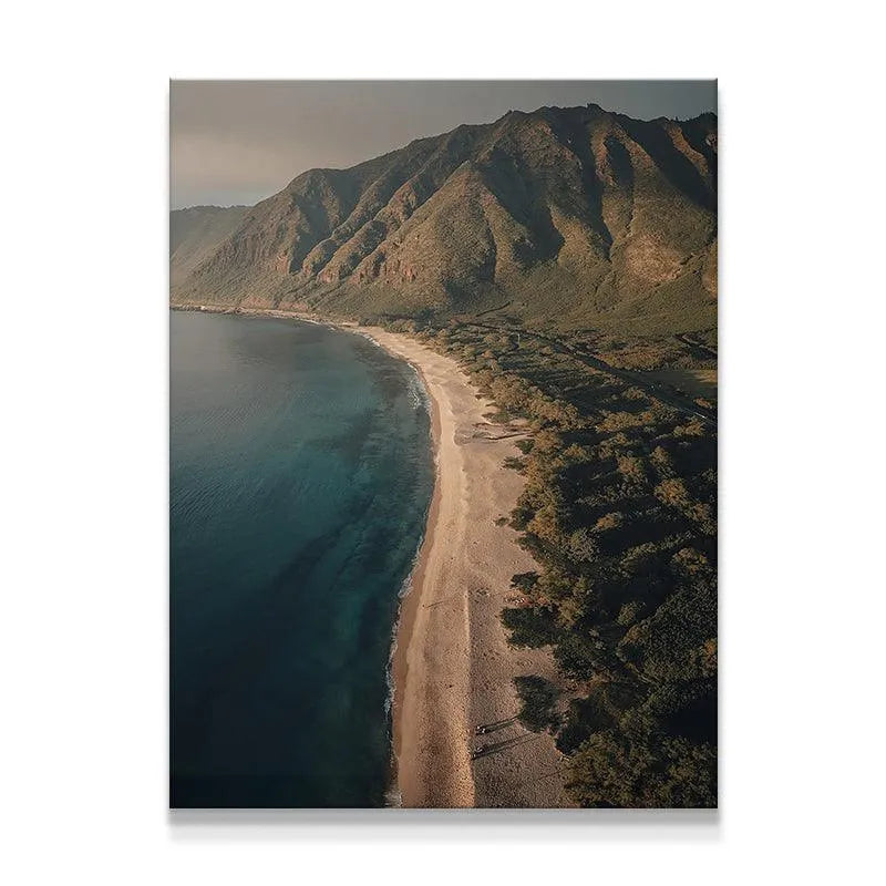 Aerial perspective of rugged mountains meeting the secluded beach, 'Island Side View' canvas.
