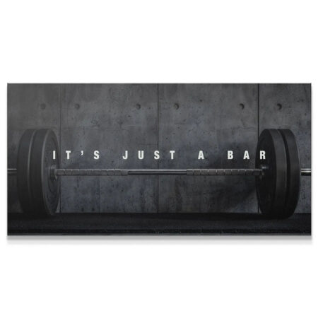 Full view of a loaded barbell resting on a gym mat, emphasizing It's Just A Bar (Floor).