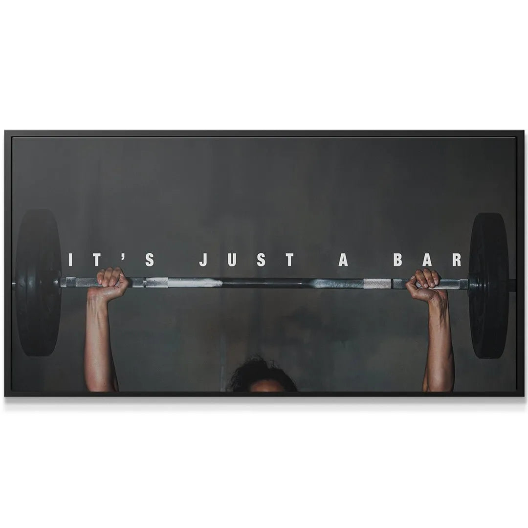 Close-up of hands gripping the knurled barbell in the It's Just A Bar (Woman) weightlifting photo.