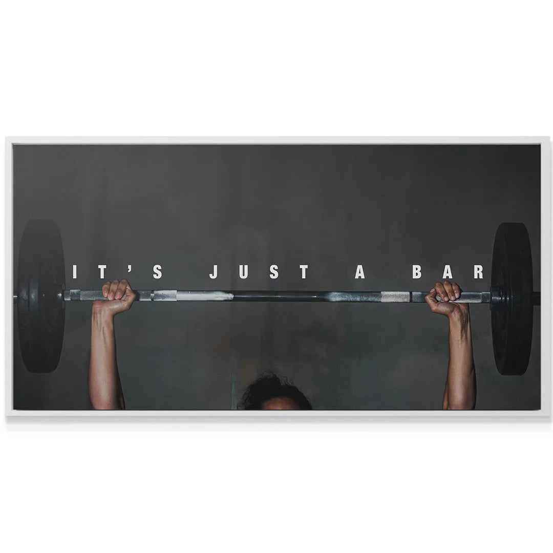 Bold white text 'IT'S JUST A BAR' overlaid on the high-contrast image of It's Just A Bar (Woman) mid-lift.