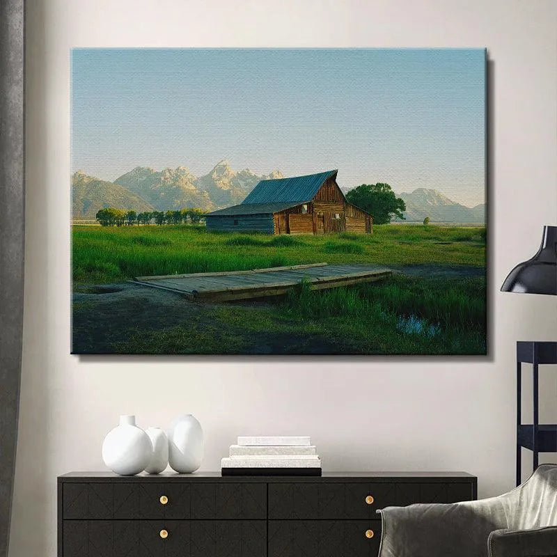 Detailed view of the bright, saturated green meadow grass dominating the bottom half of the Jackson Greens photography print.