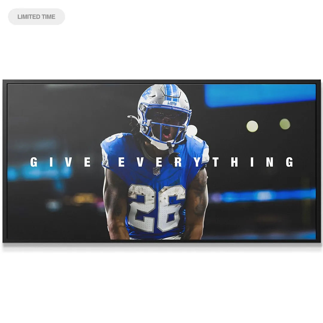 Wide canvas print depicting Jahmyr Gibbs #26 mid-scream with the phrase "Jahmyr Gibbs - Give Everything" overlaid.