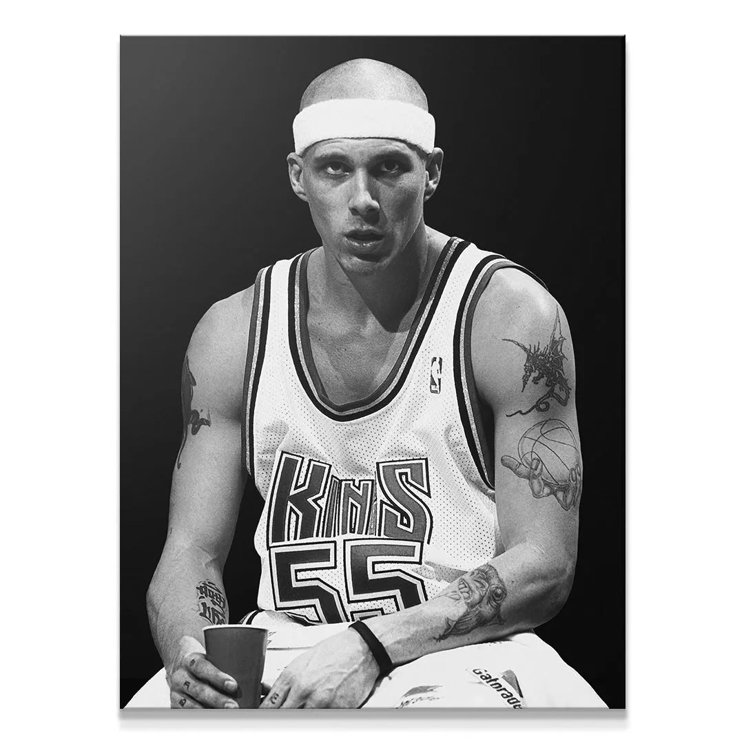 Close-up portrait of Jason Williams - #2 showing intense facial expression and white headband.