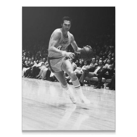 Dynamic action shot of Jerry West - #1 driving hard with the basketball in a vintage photo.