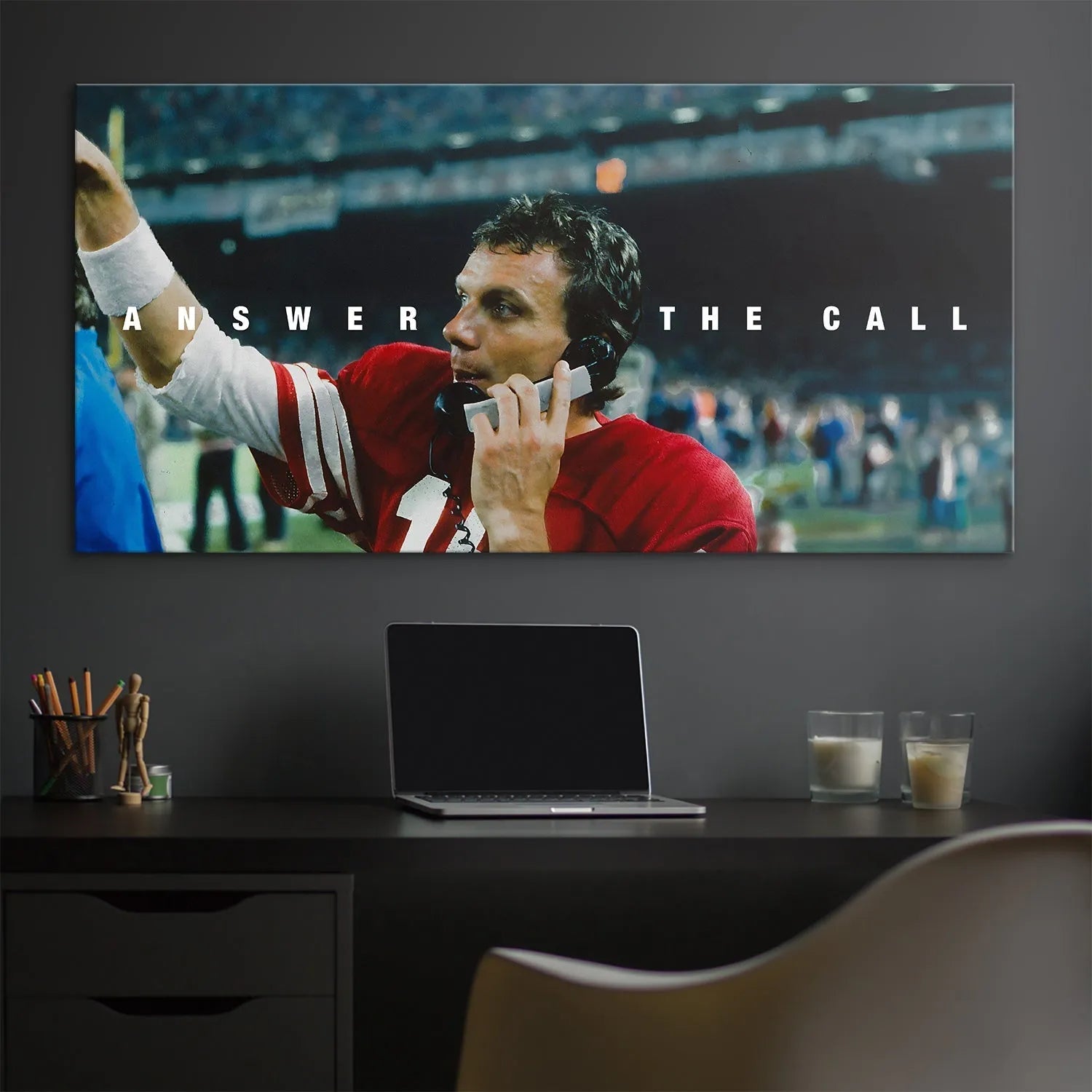 Side angle showing the red jersey, white wristband, and intense expression of Joe Montana in the powerful 'Joe Montana - Answer The Call' image.