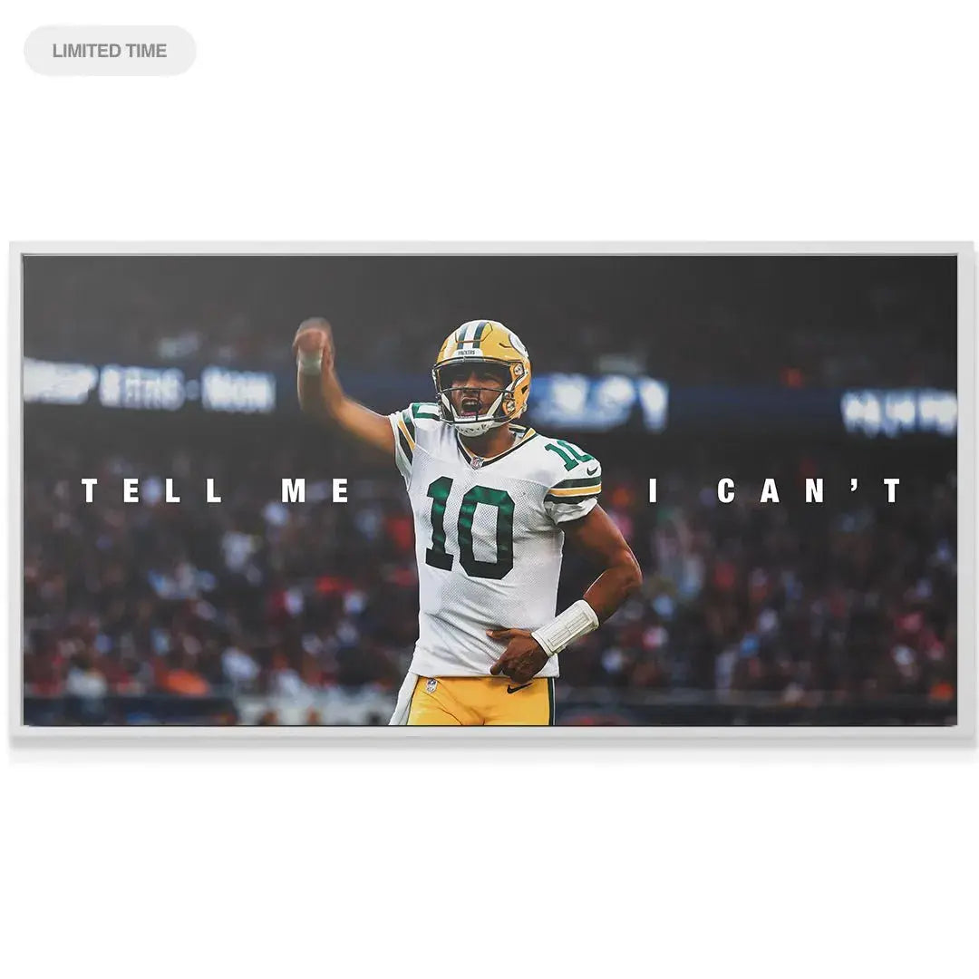 Lifestyle shot of the 'Jordan Love - Tell Me I Can't' artwork displayed above a sleek modern desk setup.