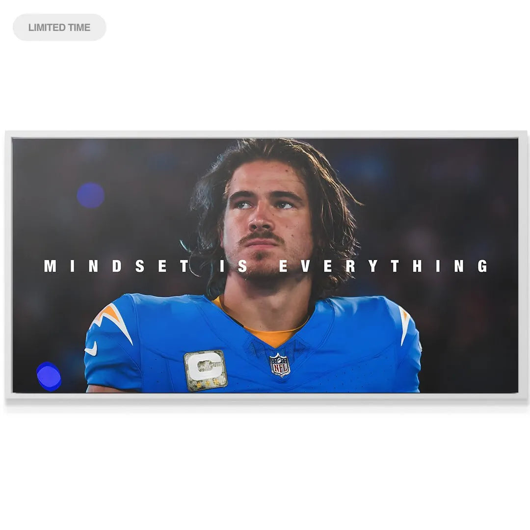 Textured canvas material view of Justin Herbert's intense expression, emphasizing the message "Justin Herbert - Mindset Is Everything."