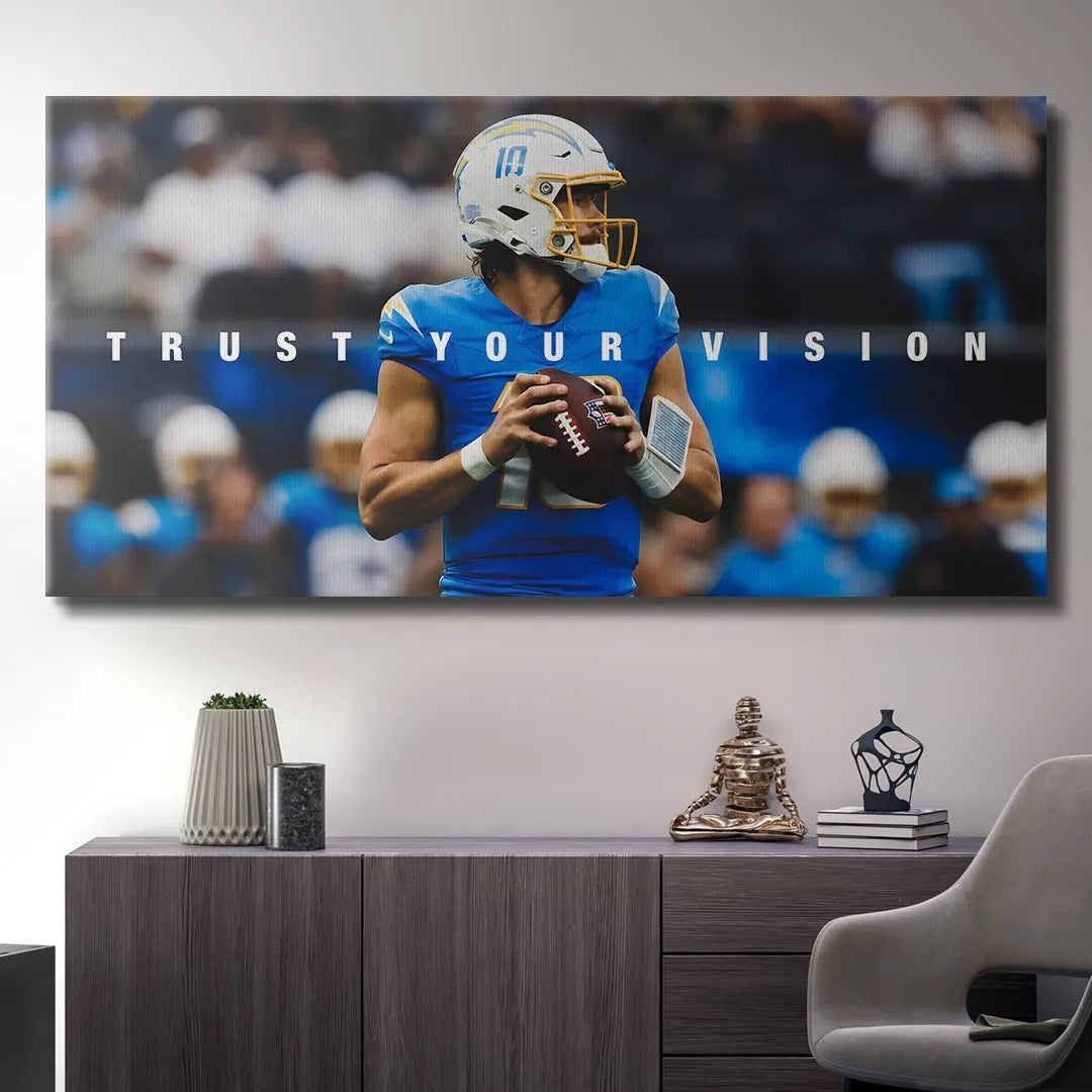 Angled perspective of the QB's face mask and helmet in the 'Justin Herbert - Trust Your Vision' collectible canvas.
