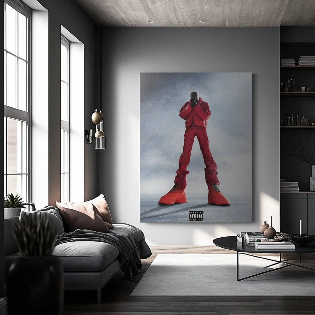 Full view of Kanye West - Donda Red canvas art displayed above a modern gray sofa in a lifestyle setting.