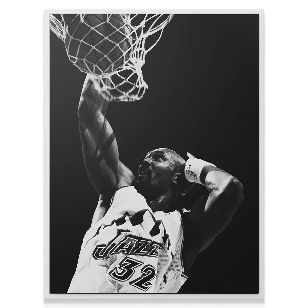 Textured visual showing the basketball net ripping as Karl Malone - #1 scores two points.