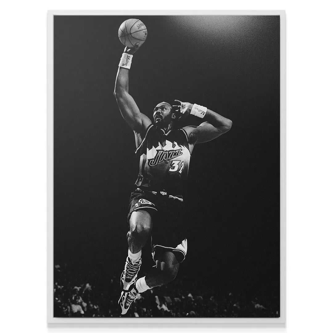 Close-up texture of the basketball held high by the massive hands of Karl Malone - #4.