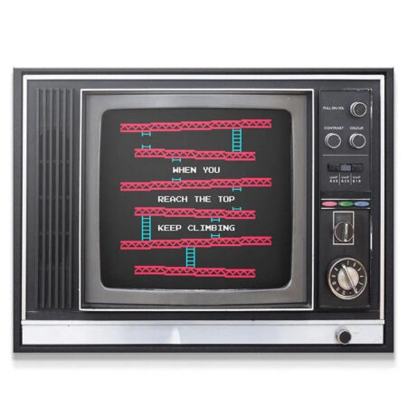 Full view of the retro television showing the "Keep Climbing" 8-bit game screen art.