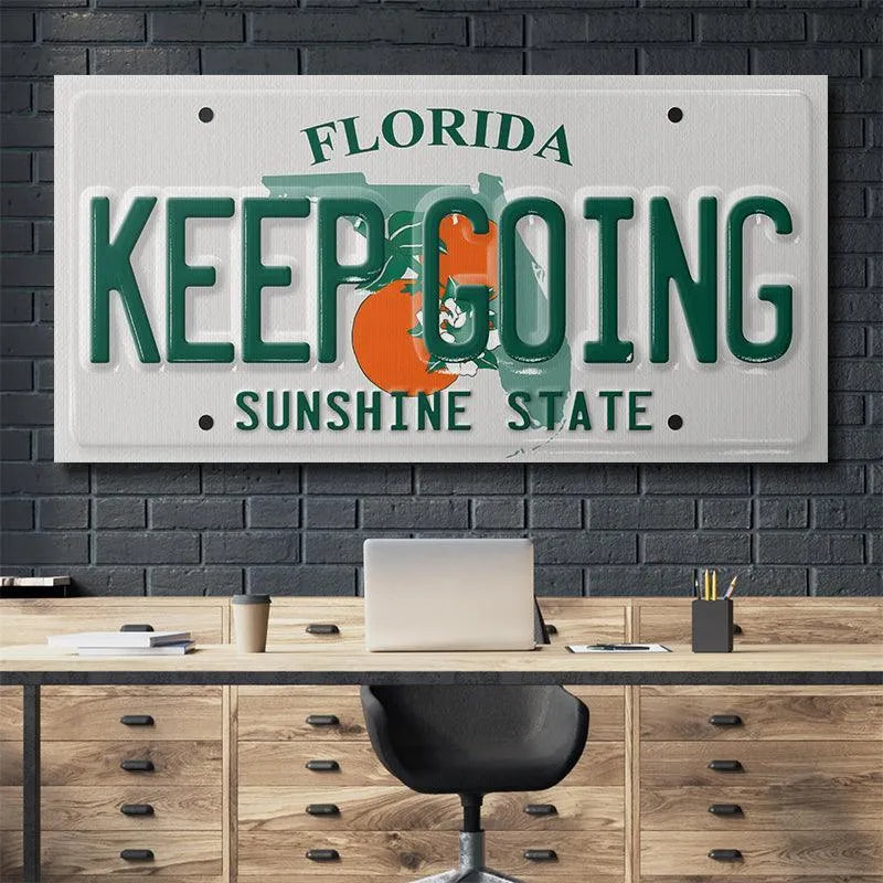 Detailed view of the orange citrus graphic overlaying the Florida map outline on the Keep Going - FL design.
