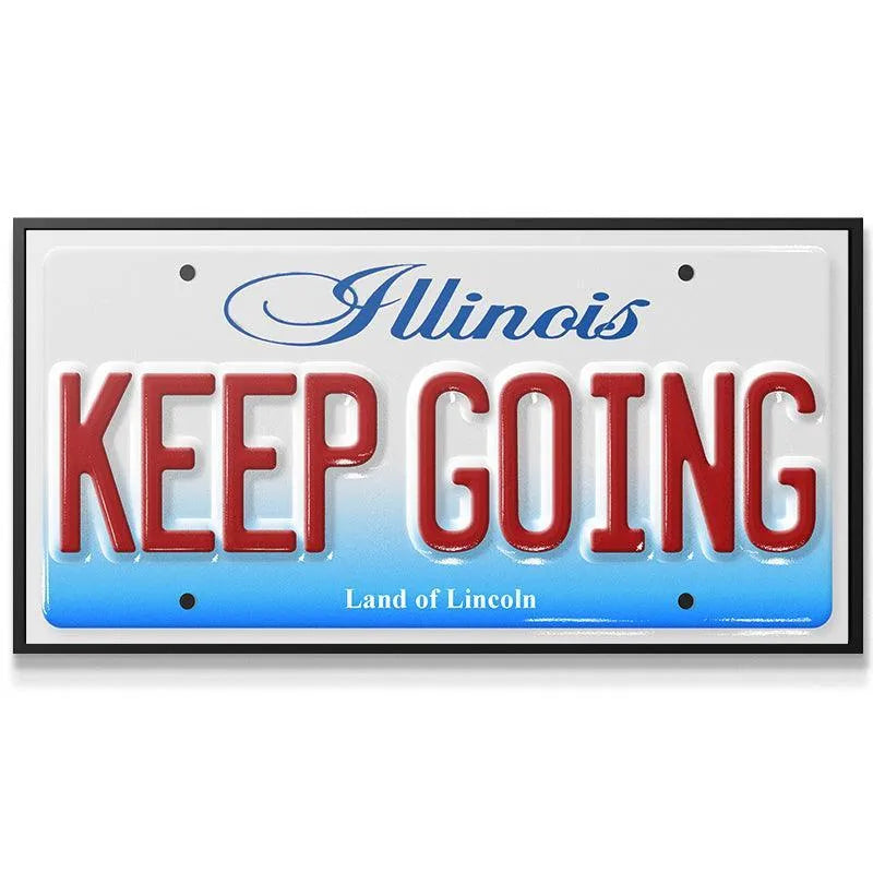 Full frontal view of the high-gloss reflective surface of the motivational tag, Keep Going - IL.