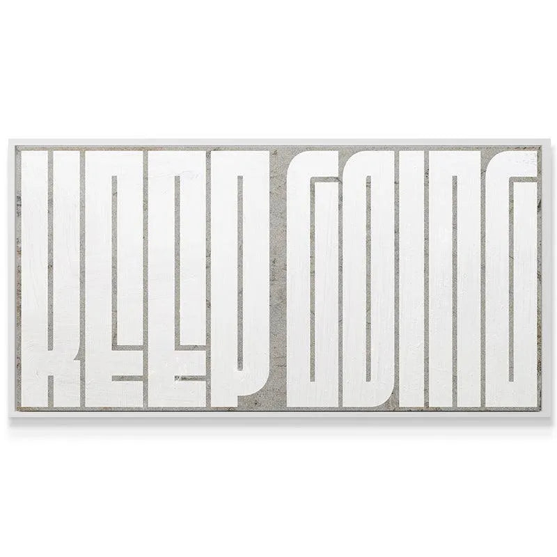 Keep Going - Maze (White) artwork styled horizontally above a modern desk in a bright, minimalist home office setting (lifestyle view).