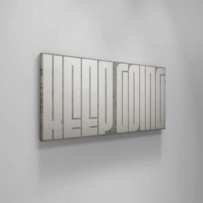 Focus on the high contrast between the bright white paint and the dark gray substrate texture of Keep Going - Maze (White).