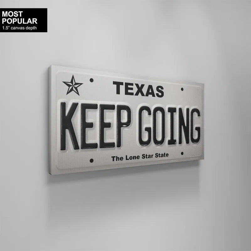 Display of the 'Keep Going - TX' plate next to other Western-themed décor items on a shelf.