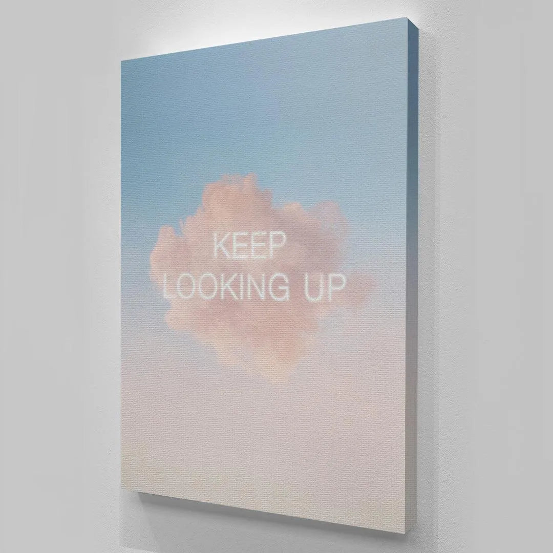 Bohemian-style bedroom wall decoration showing the pastel Keep Looking Up print above a bed.