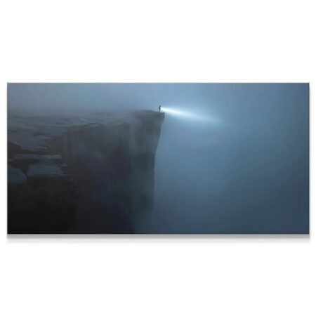 Panoramic view of the foggy cliff featuring the solitary figure with the headlight, illustrating 'Keep Searching (No Quote)'.