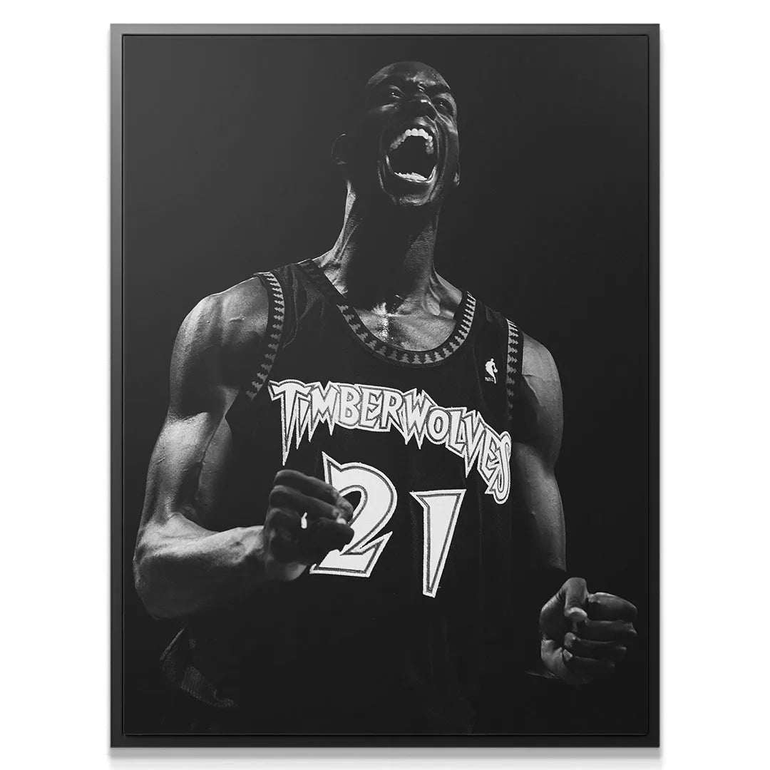 Black and white action photo of Kevin Garnett - #3 celebrating, focusing on the jersey texture.