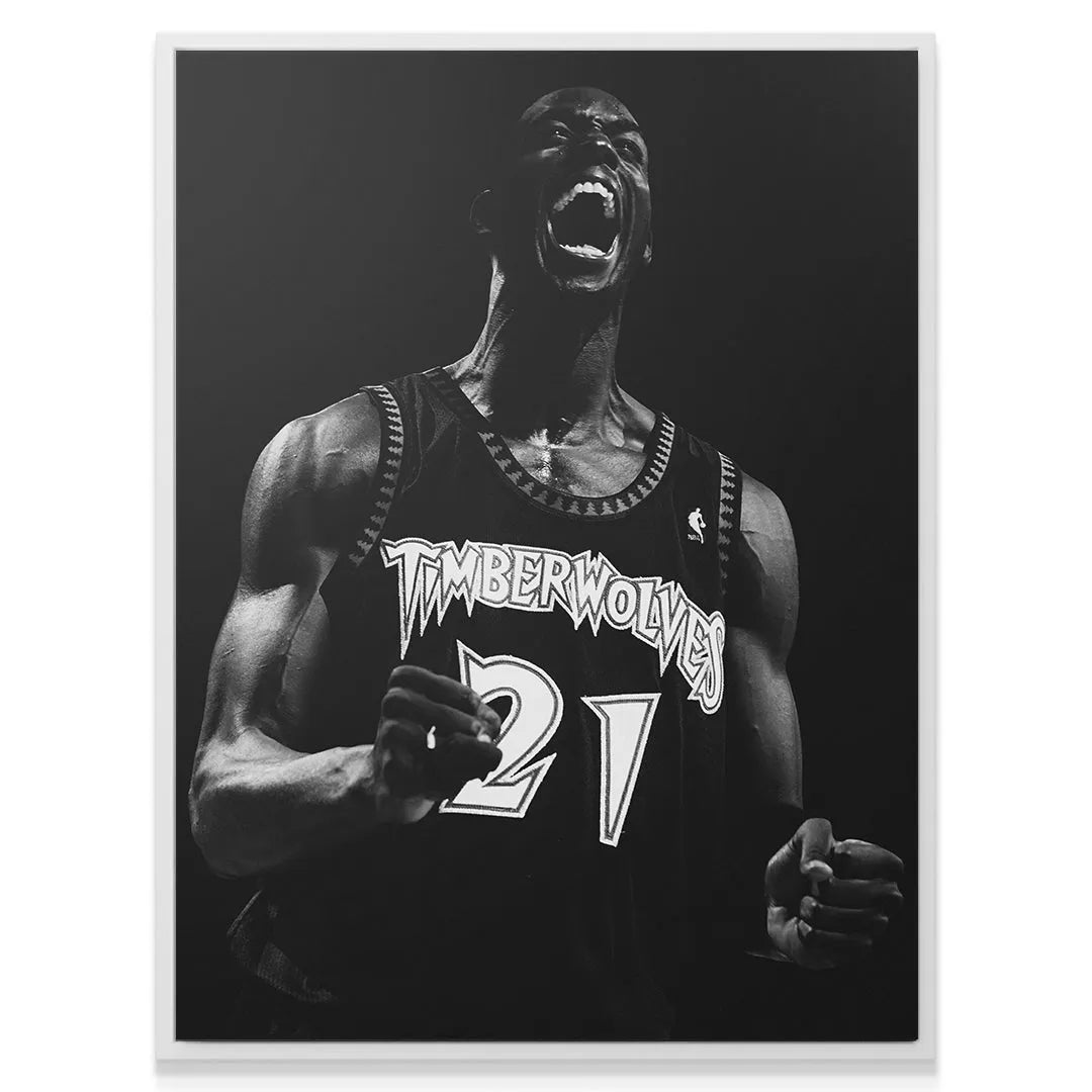 Dramatic studio lighting highlighting the muscles of Kevin Garnett - #3 in intensity.