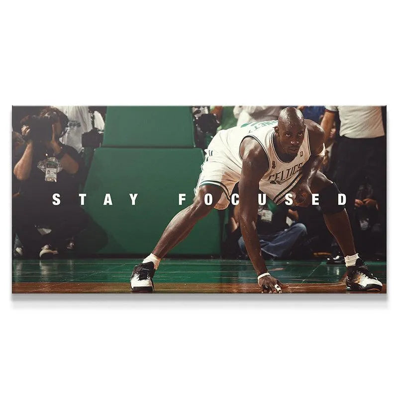 Wide view of Kevin Garnett - Stay Focused poster showing KG in a low crouch on the basketball court, ready for defense.
