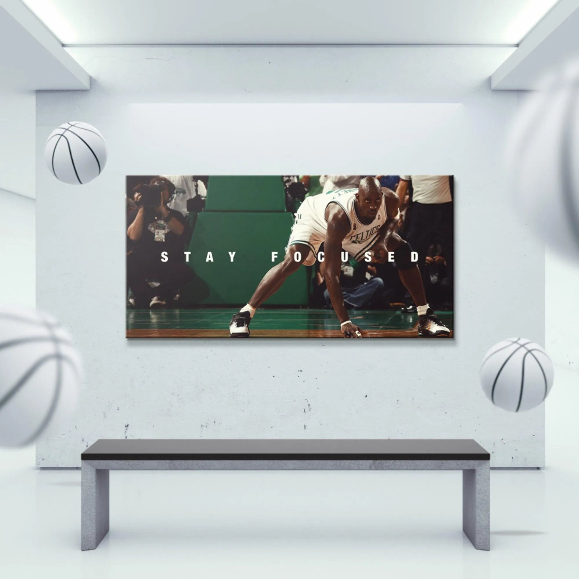Lifestyle image of the mounted Kevin Garnett - Stay Focused artwork displayed prominently in a modern office or gym setting.