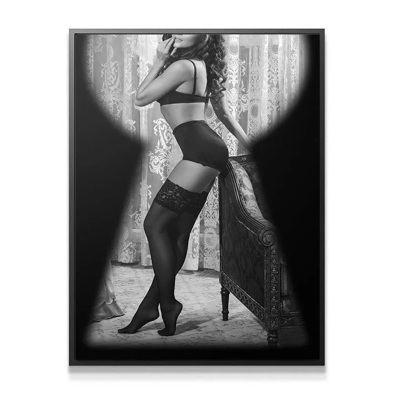 Full black and white glamour shot viewed through the stylized Key Hole framing.