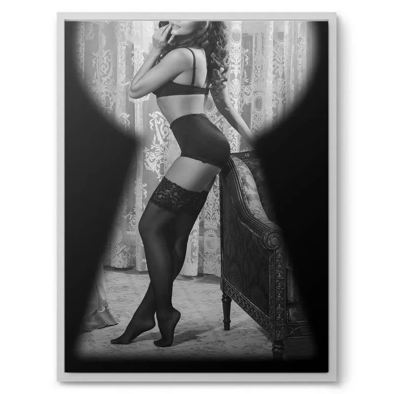 Erotic retro portrait of a brunette woman looking away, constrained by the Key Hole visual border.