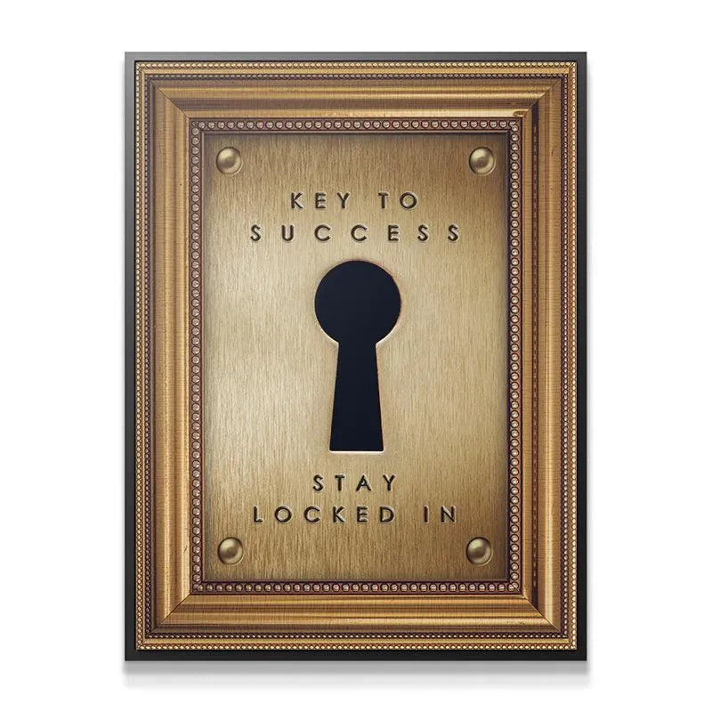 Framed motivational poster featuring the prominent keyhole design and the words "Key To Success".