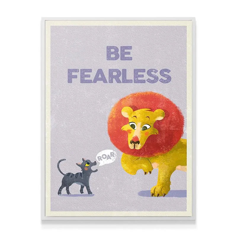 Angled lifestyle shot of the framed Kids Be Fearless wall art displayed brightly in a child's bedroom.