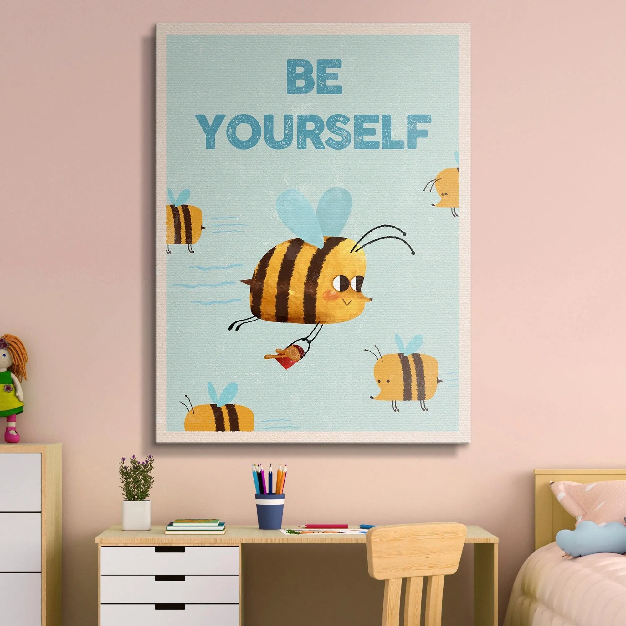Lifestyle shot of the Kids Be Yourself poster hanging above a changing station in a modern, brightly lit nursery setting.