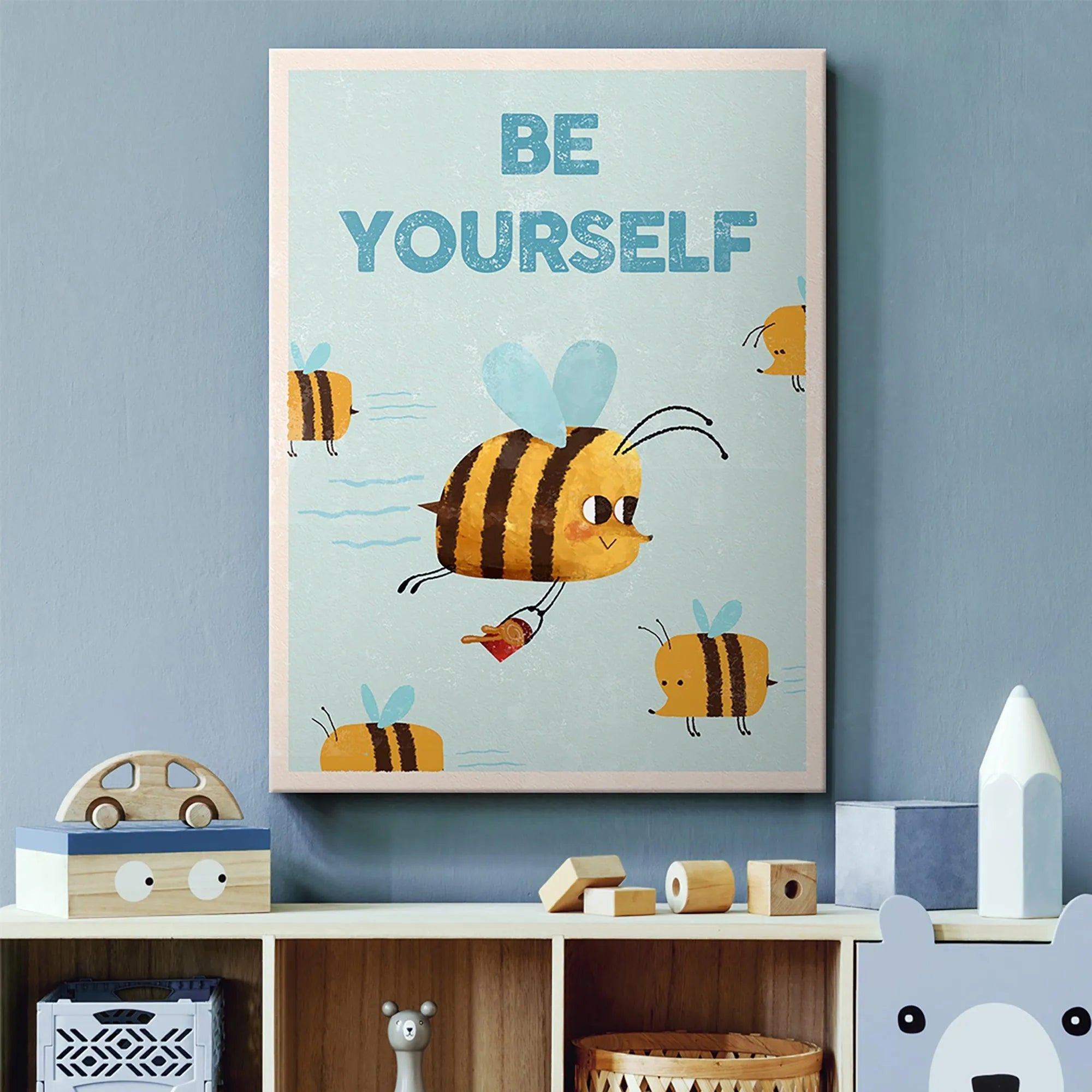 Close crop focusing on the large central bee carrying a tiny red package and smiling in the Kids Be Yourself illustration.
