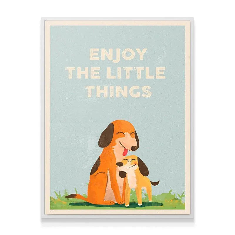 Lifestyle image showing the framed poster on a white nursery wall reminding us that Kids Enjoy The Little Things.