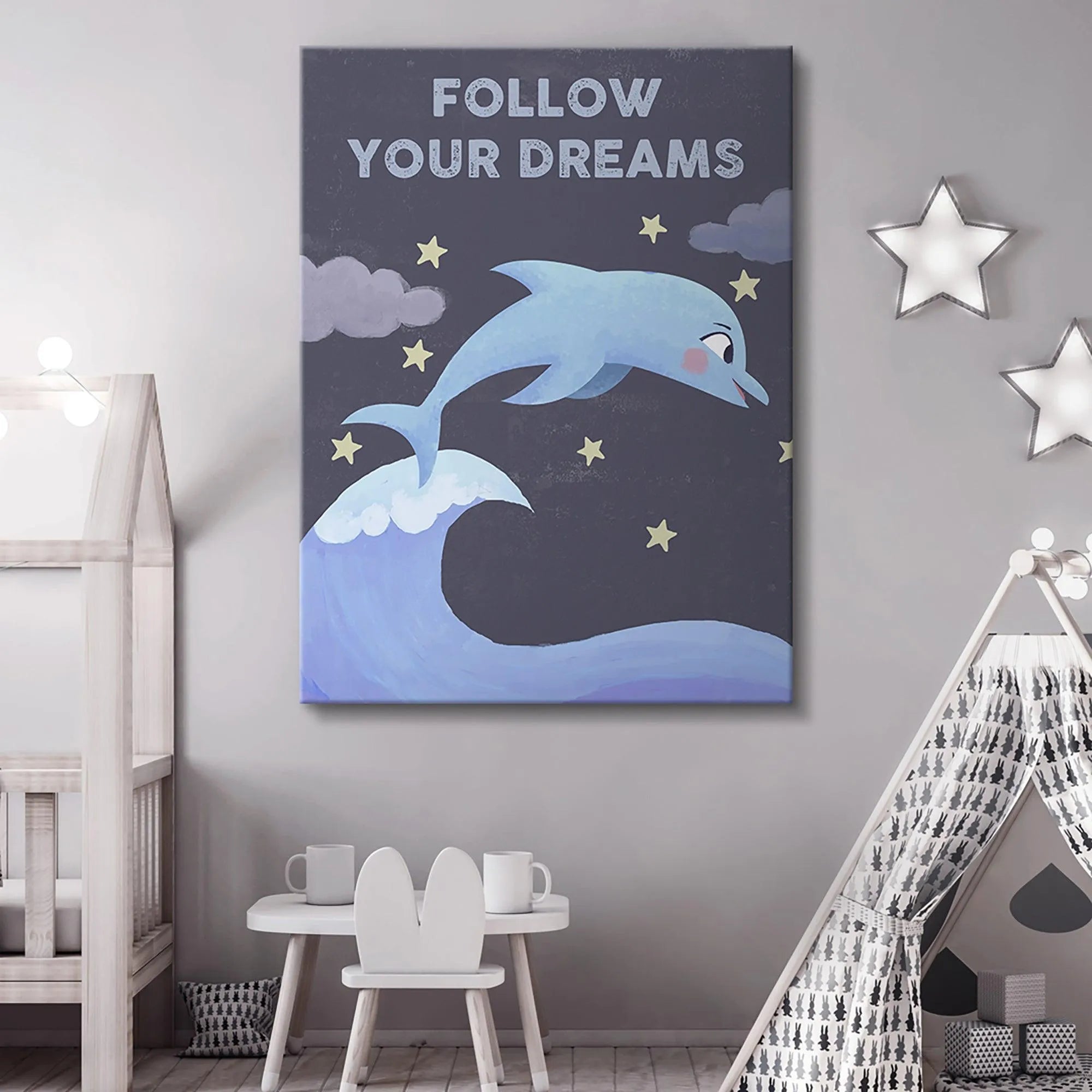 Wide angle lifestyle shot of the complete 'Kids - Follow Your Dreams' wall art hanging above a crib in a nautical-themed nursery.