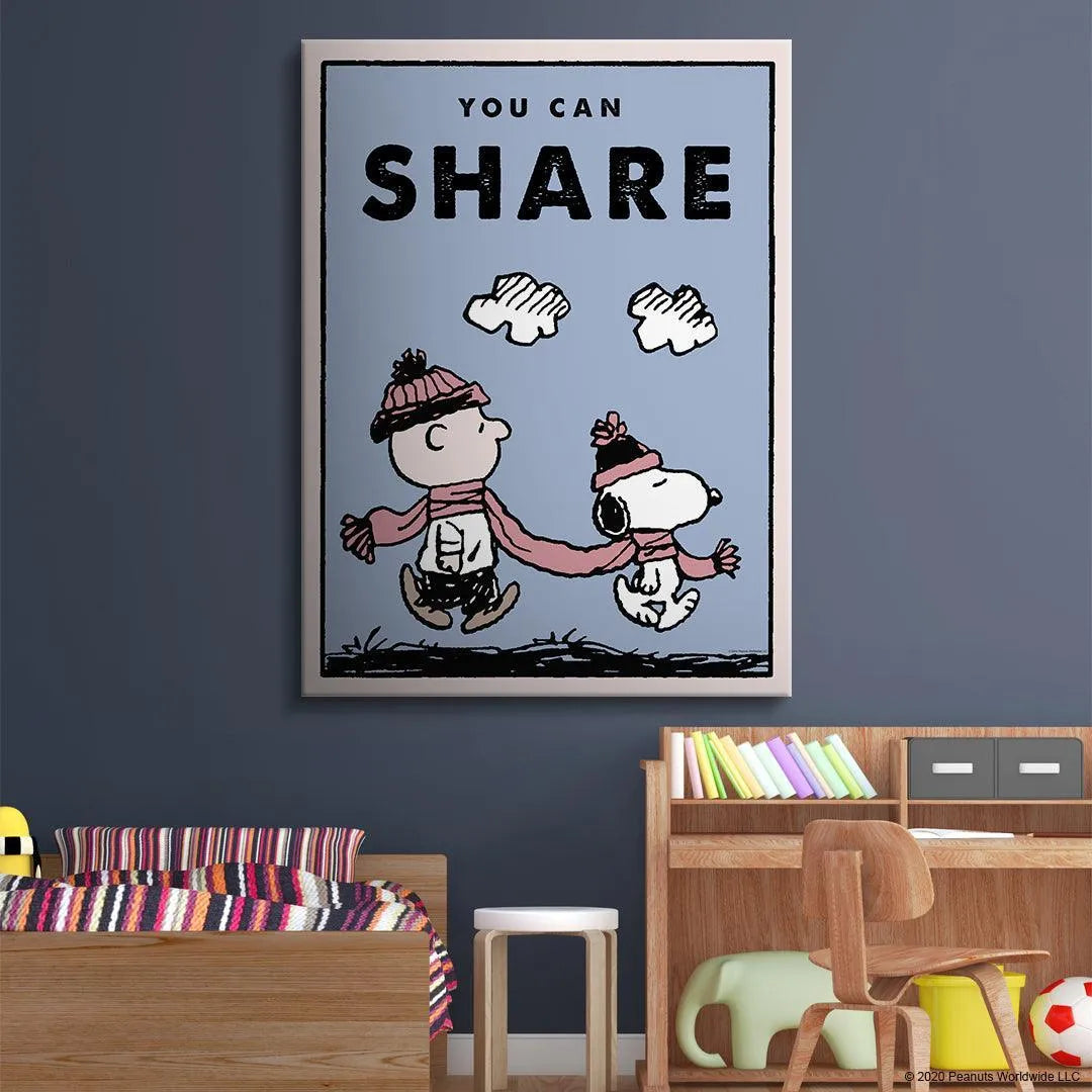 High-angle view of the motivational Kids PEANUTS - You Can Share framed artwork suitable for a child's bedroom.