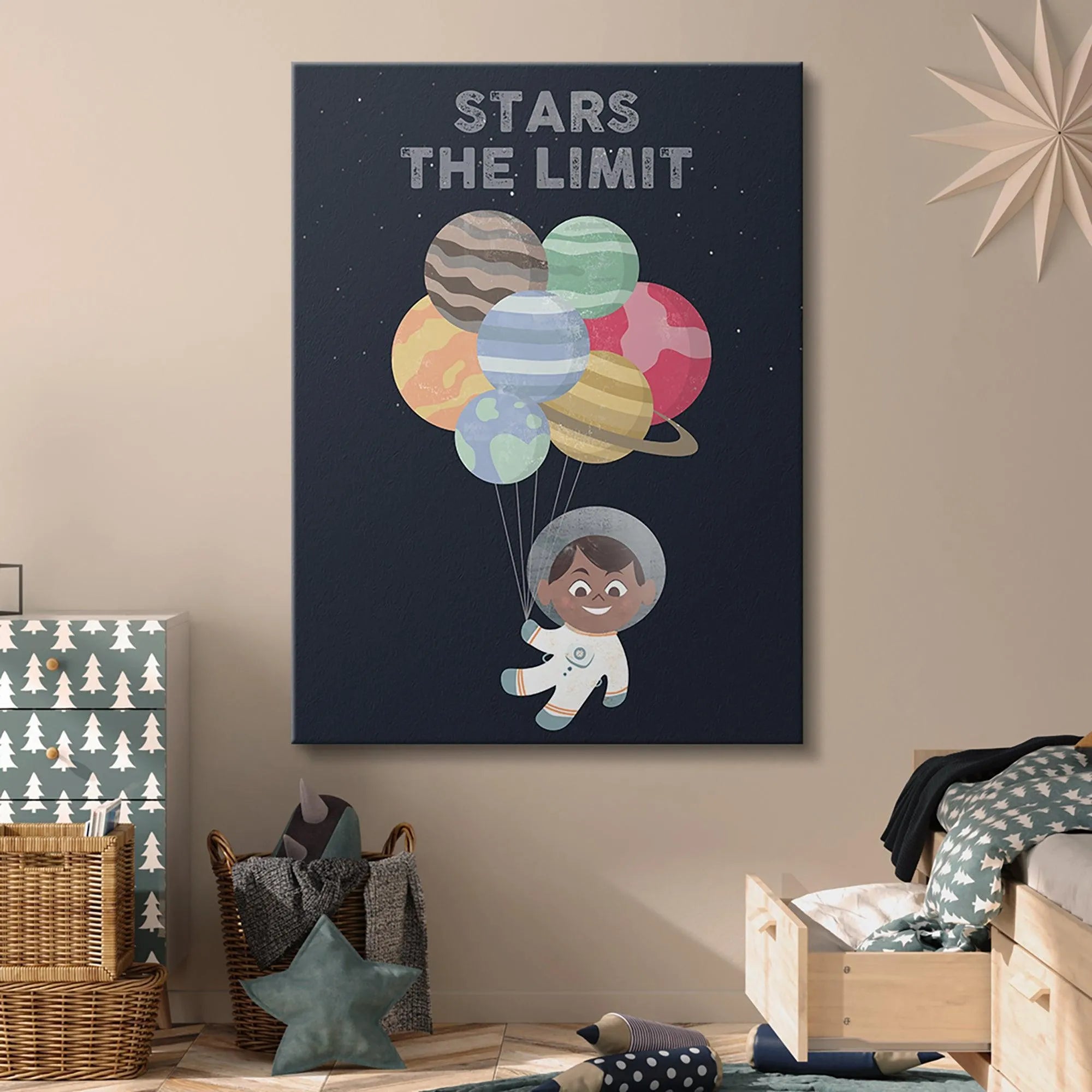 Overhead angle showing the vibrant, multicolored planets acting as balloons in 'Kids - Stars The Limit' artwork.