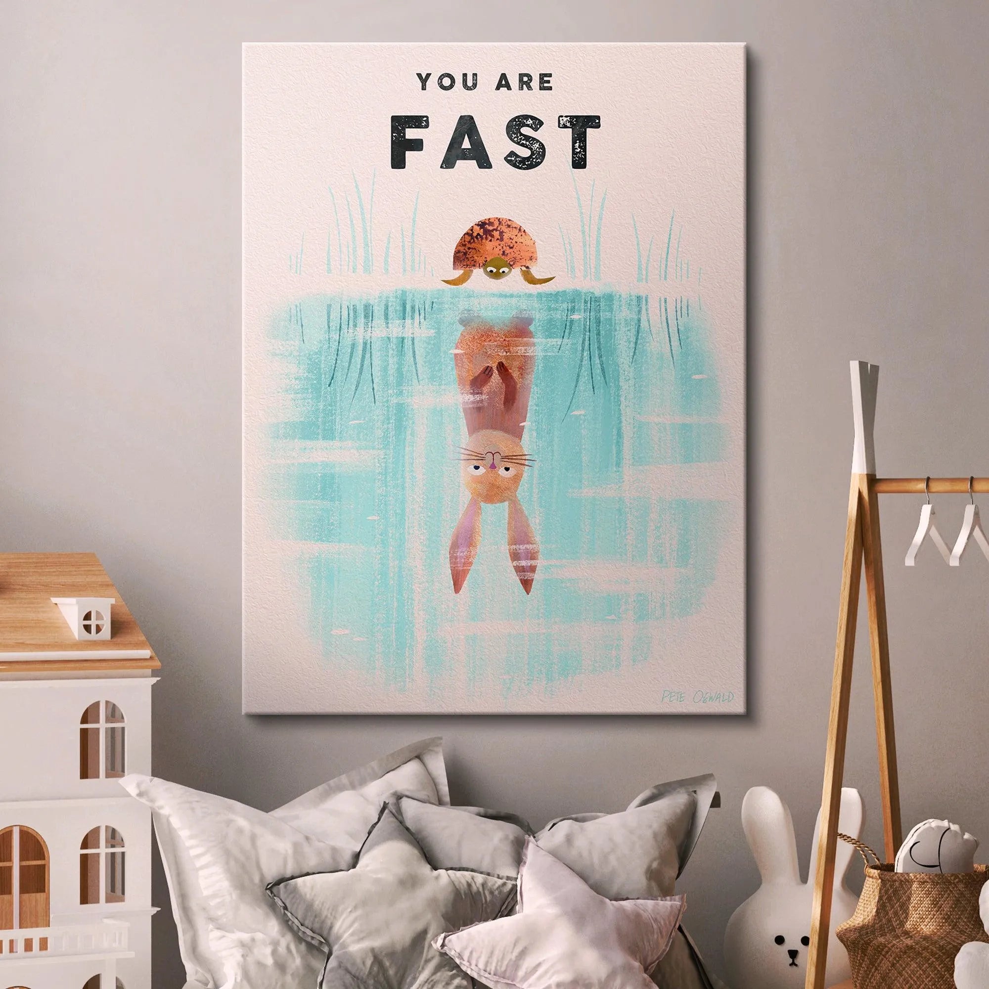 Artistic flat lay of the 'Kids You Are Fast' print positioned alongside soft toys for nursery inspiration.