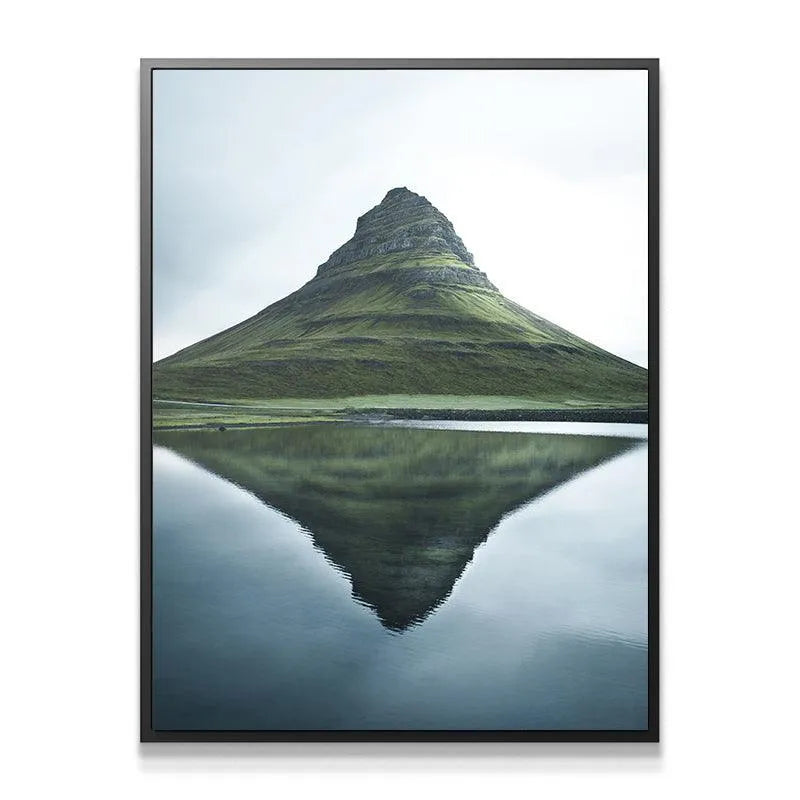 Vertical panorama capturing the imposing height and symmetry of Kirkjufell.