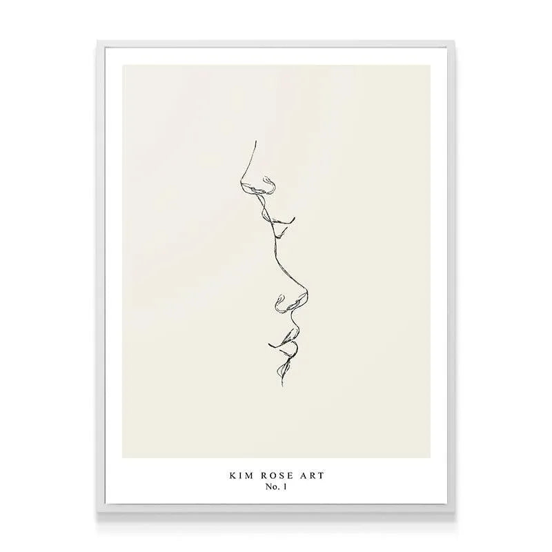 Lifestyle setting showing the vertical orientation of the Kiss - White print above a clean white sofa.