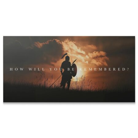 Dramatic wide shot of the 'Knight - Remembered' silhouette against the blazing sunset sky.
