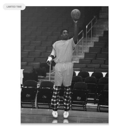 Full length black and white photo showing Kobe Bryant - By Any Means taking a focused jump shot during practice.
