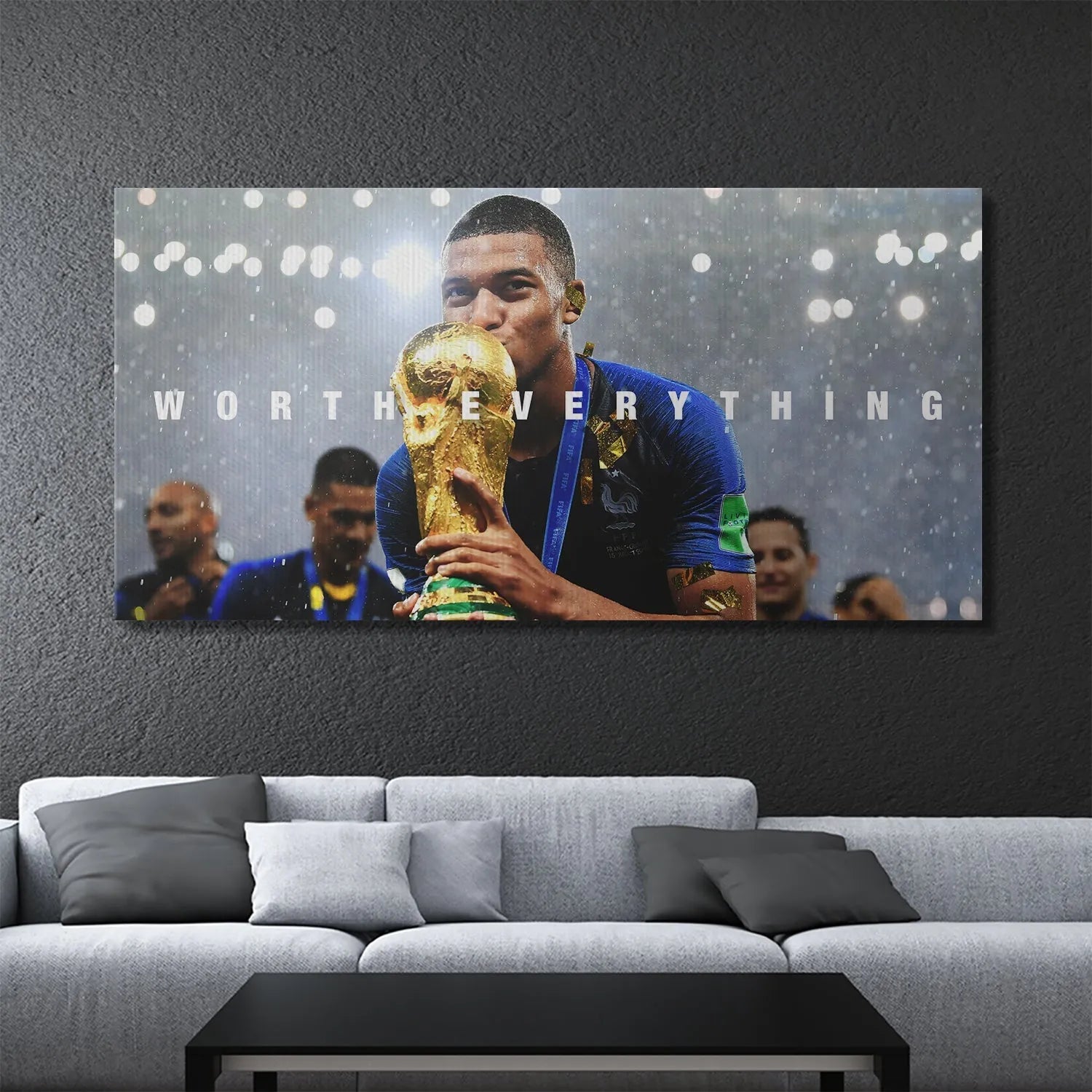 Detailed texture shot showing the golden confetti and rain effect against the dramatic stadium backdrop, Kylian Mbappe - Worth Everything.