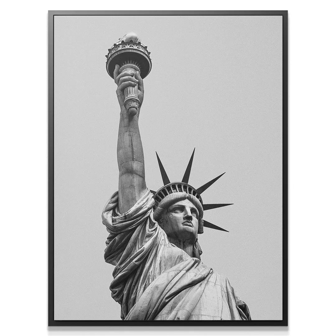 Dramatic upward angle view of the raised torch against the pale sky in Lady Liberty 2 artwork.