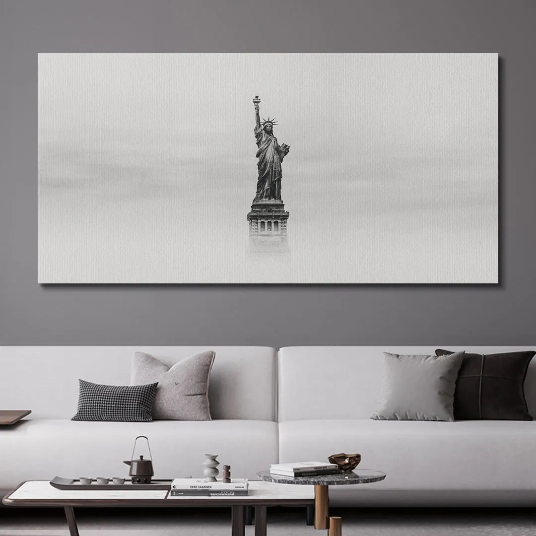 High-contrast image of the crown and torch of the statue emphasizing the dramatic lighting of Lady Liberty - B&W.