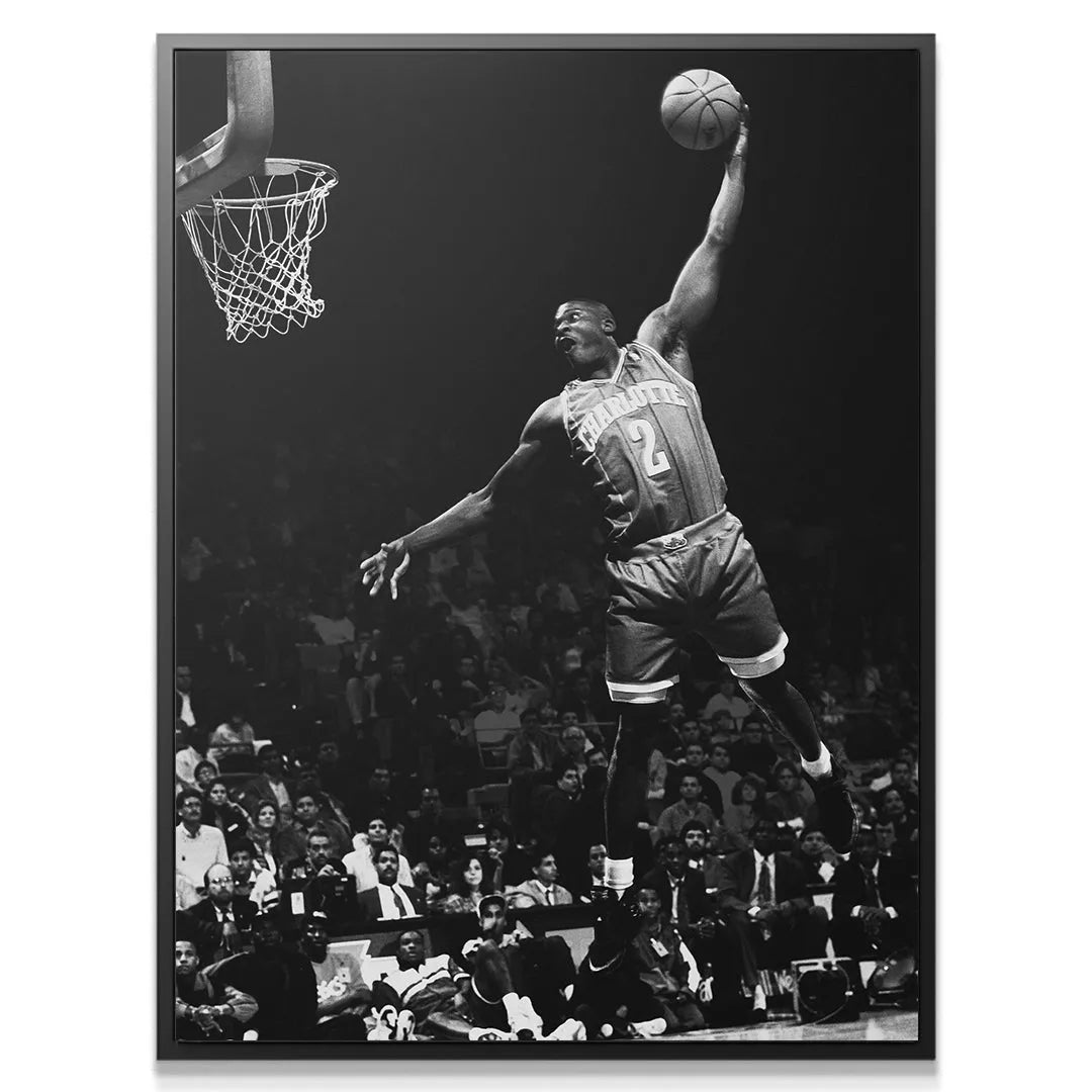Close-up detailed view of the intense facial expression of Larry Johnson - #1 while attacking the basket.