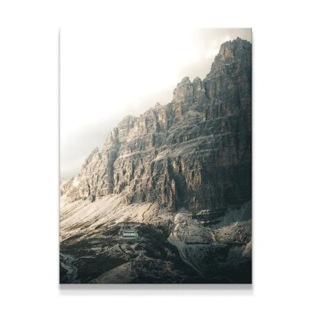 Wide shot of the imposing mountain face under the 'Last Light' sky.