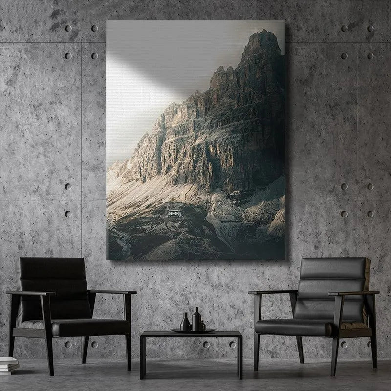 Vertical composition showcasing the sheer height of the peaks during 'Last Light'.