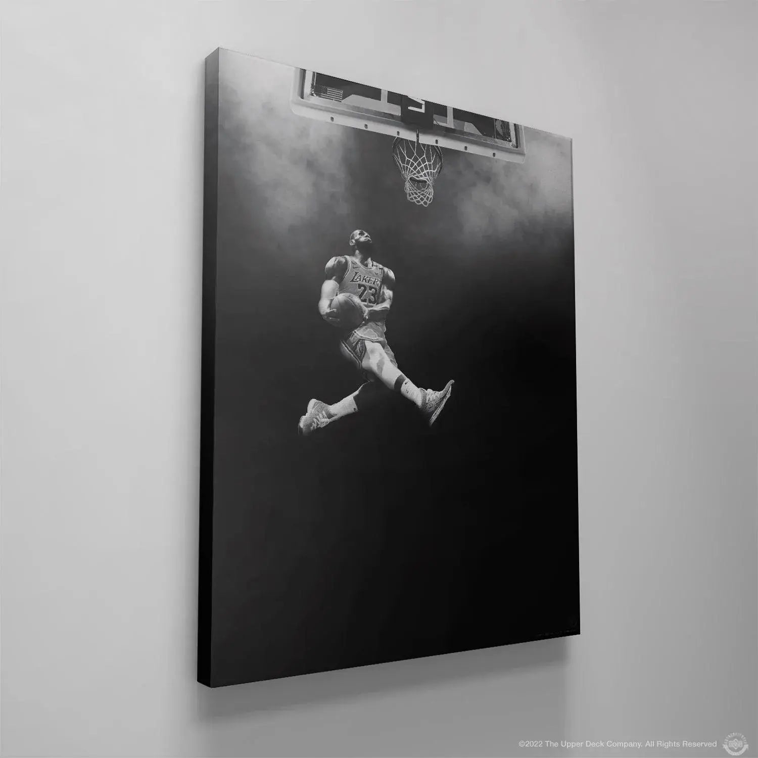 Lifestyle context view showing the framed 'LeBron James - Abyss' wall art displayed in a modern fan cave.